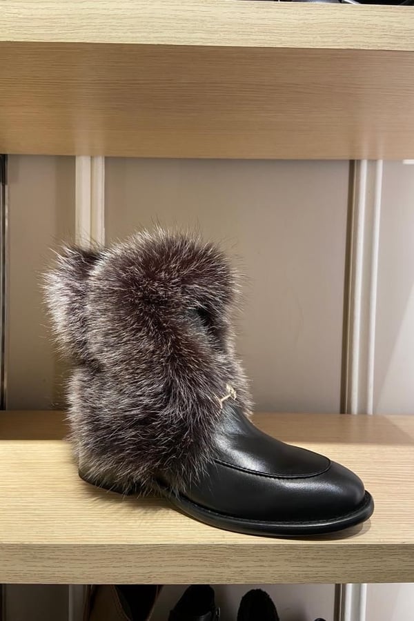 Black shoes with gold fur