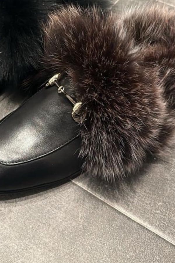 Black slippers gold fur